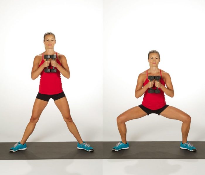 Woman performing a sumo squat