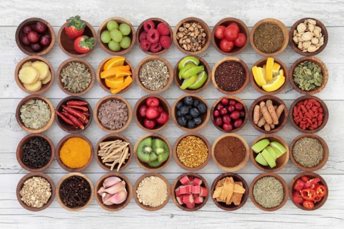 selection of bowls, each with colourful foods in.