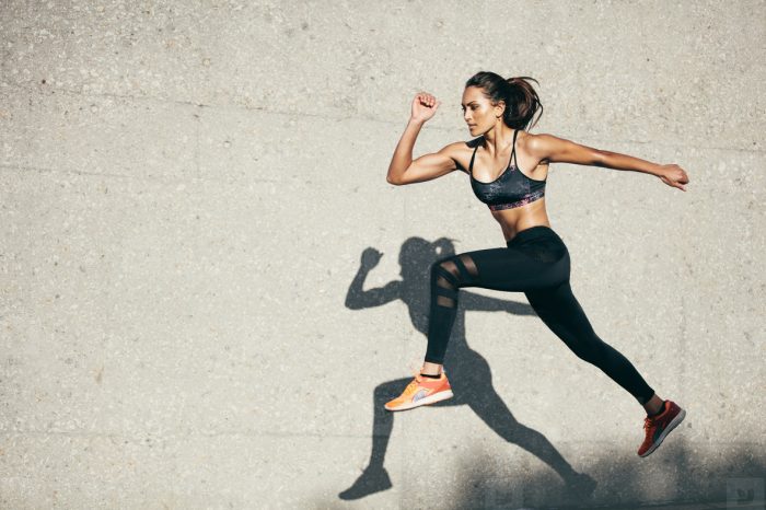 woman exercising and jumping