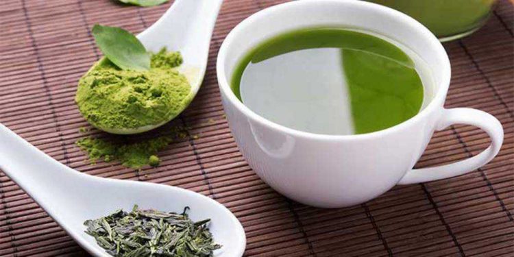 green tea powder and leaves