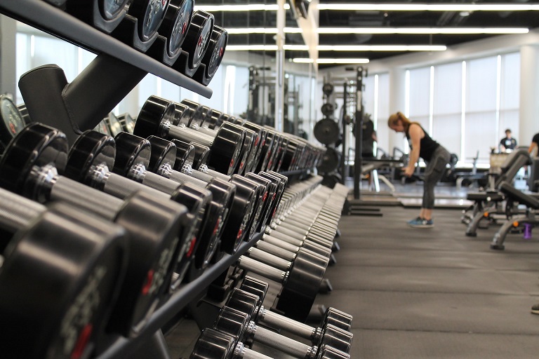 Woman in a quiet gym