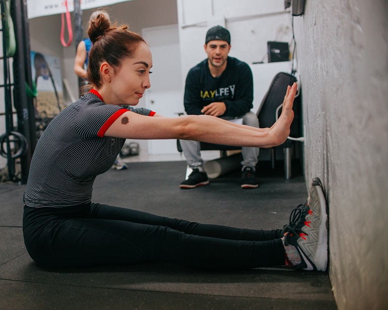 Woman with a personal trainer